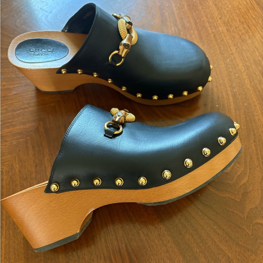 Gucci Black and Gold Mules with Chic Design